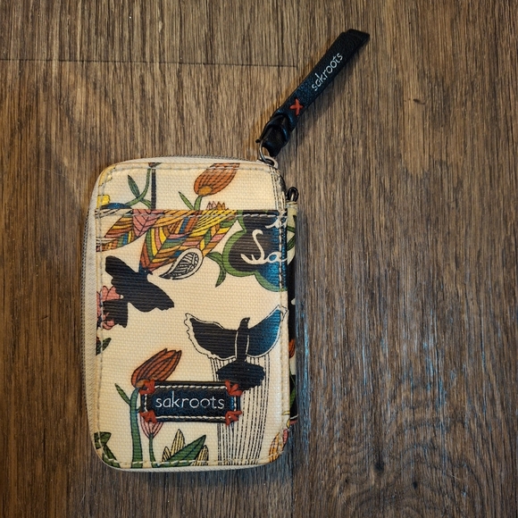 The Sakroots Peace Crossbody Wallet. - Picture 5 of 15